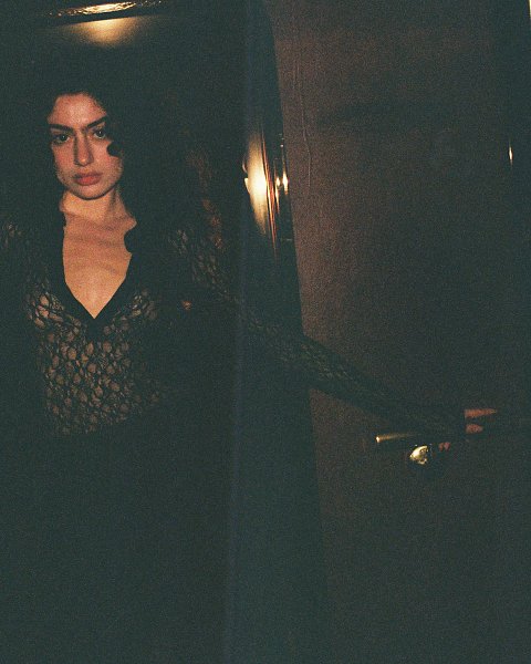 DAYLIGHT WANDERS INTO EVENING