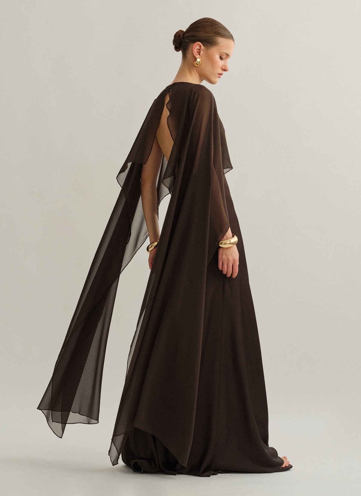 Γυναικεία ασύμμετρη ημιδιάφανη κάπα