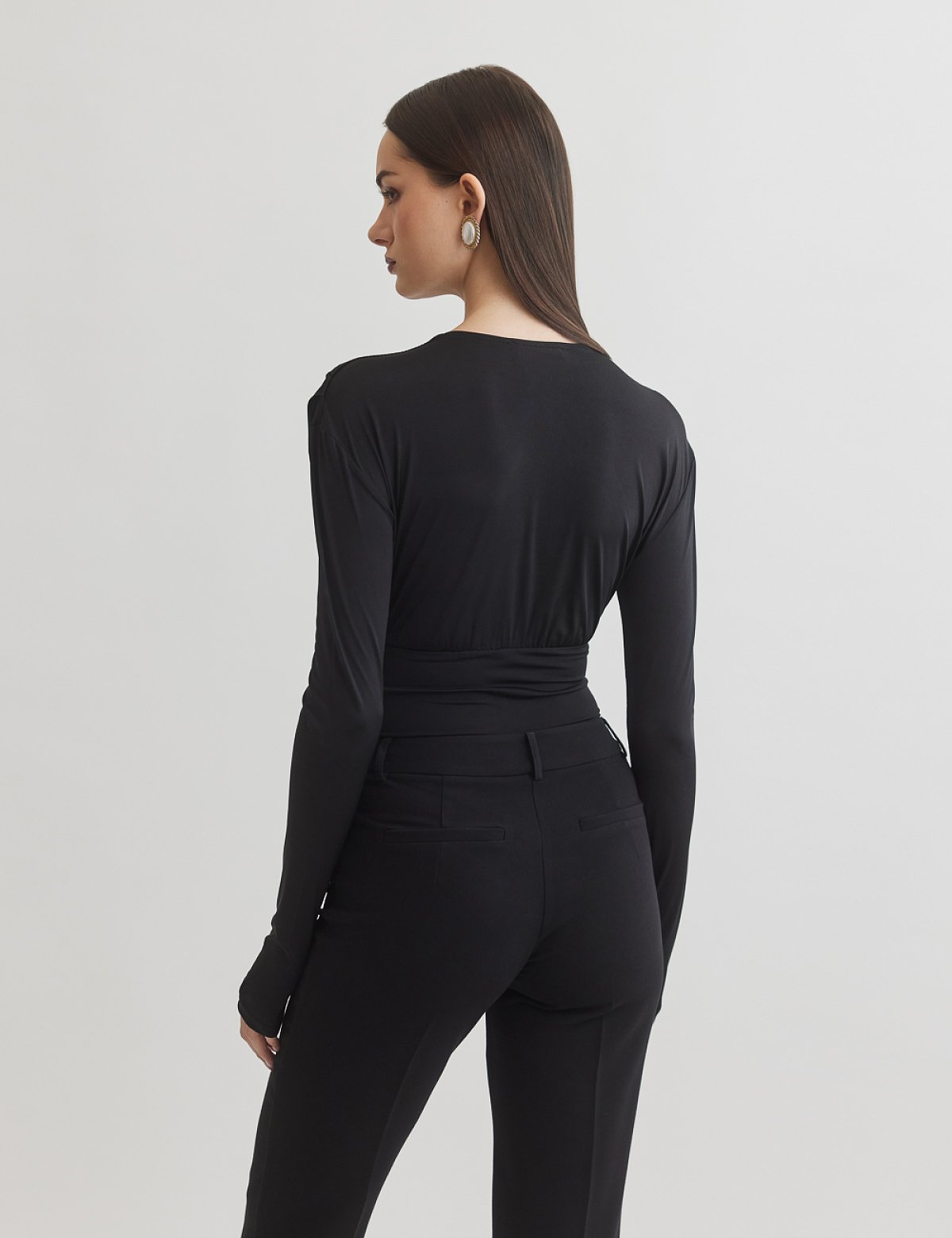 Γυναικείο μακρυμάνικο κορμάκι με ντεκολτέ V