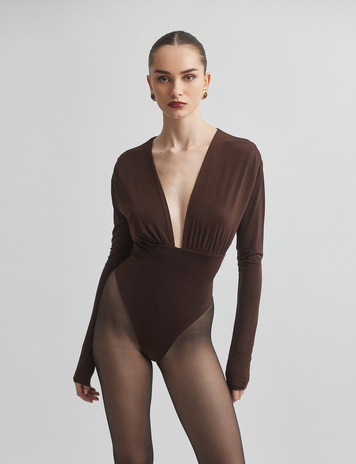 Γυναικείο μακρυμάνικο κορμάκι με ντεκολτέ V