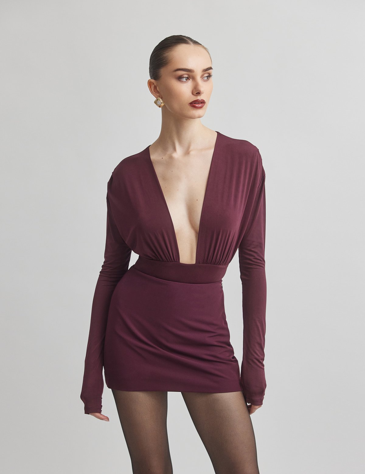 Γυναικείο μακρυμάνικο κορμάκι με ντεκολτέ V