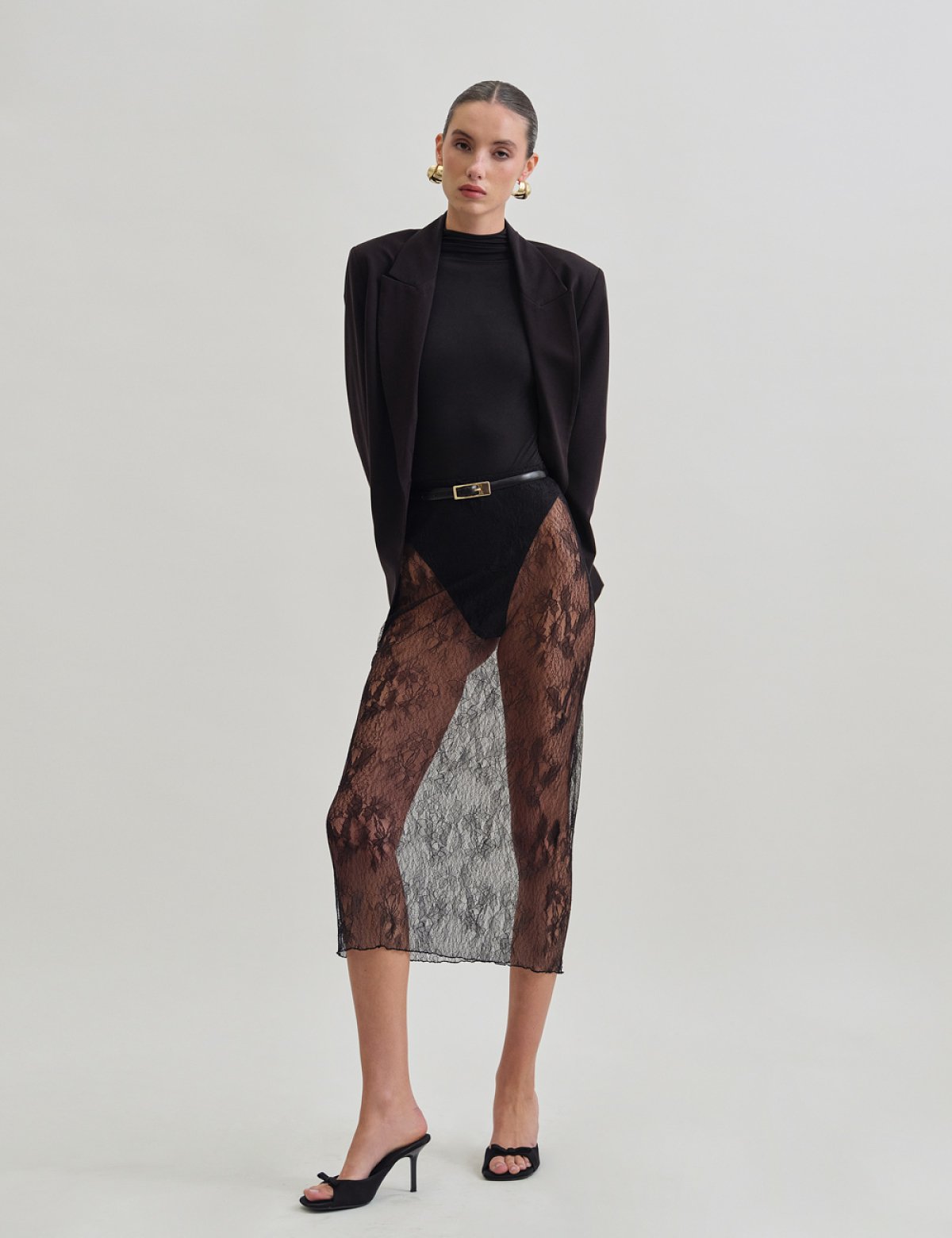 Γυναικεία midi φούστα με ύφασμα δαντέλα