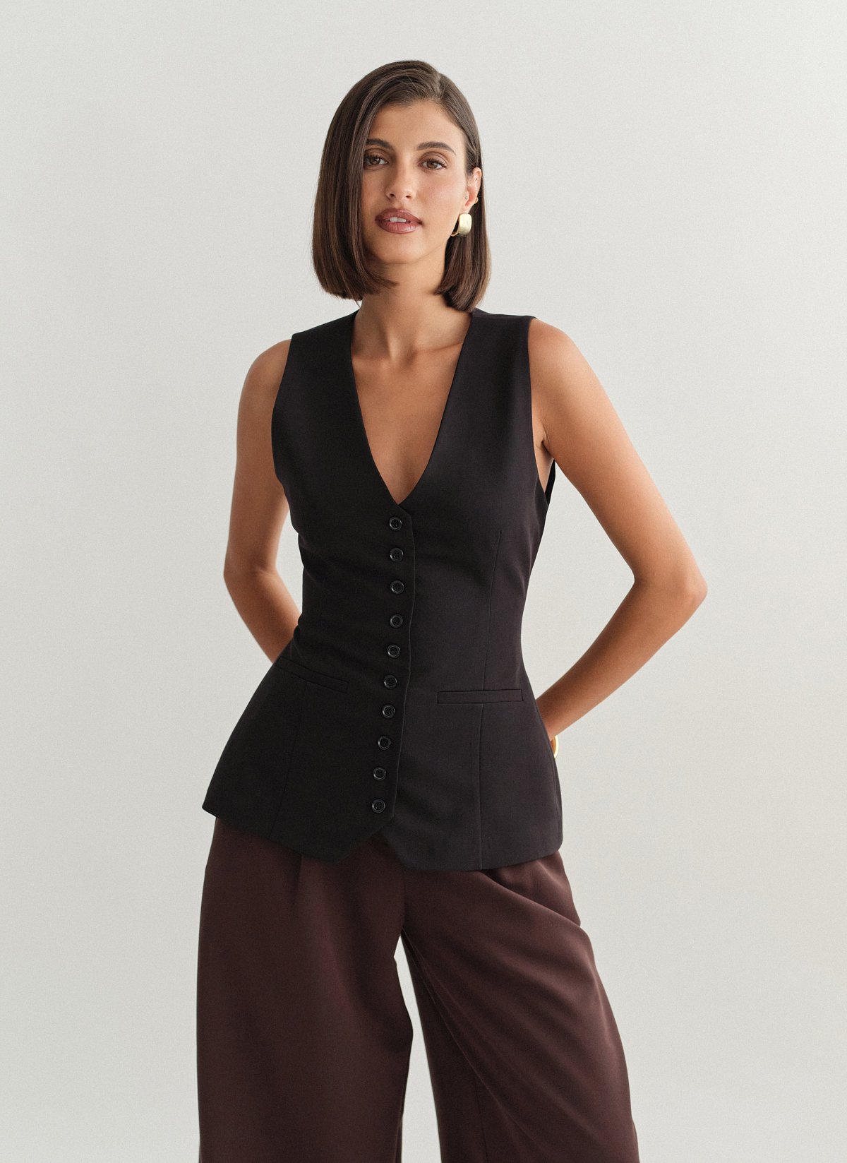 Γυναικείο μεσάτο υφασμάτινο γιλέκο με κουμπιά