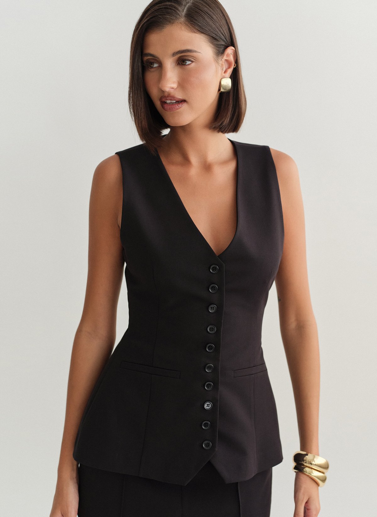 Γυναικείο μεσάτο υφασμάτινο γιλέκο με κουμπιά