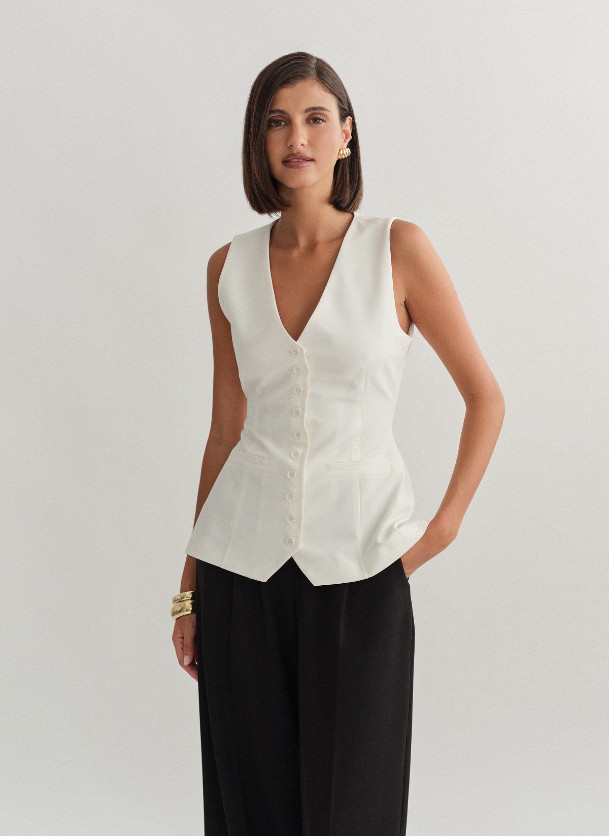 Γυναικείο μεσάτο υφασμάτινο γιλέκο με κουμπιά