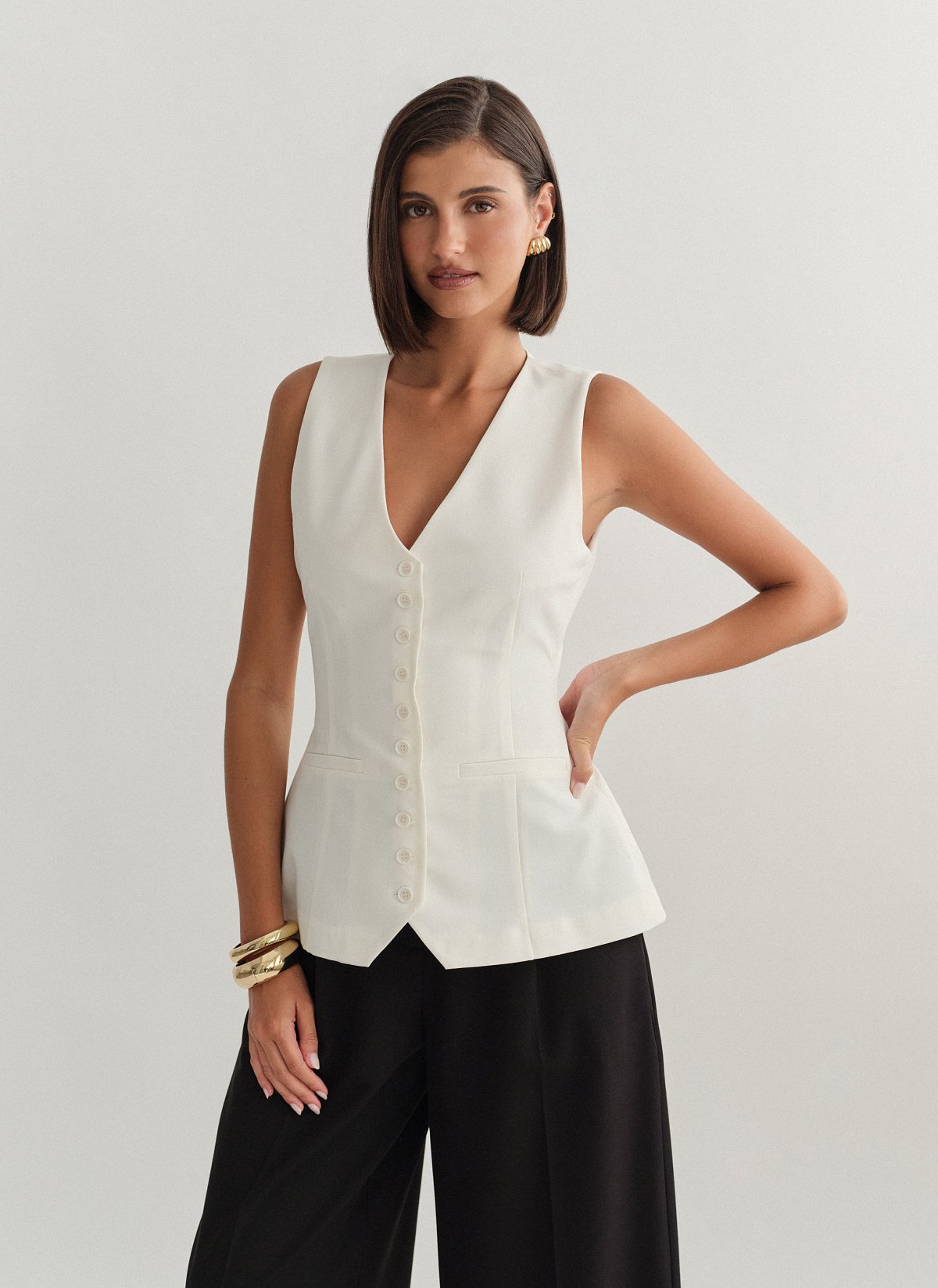 Γυναικείο μεσάτο υφασμάτινο γιλέκο με κουμπιά