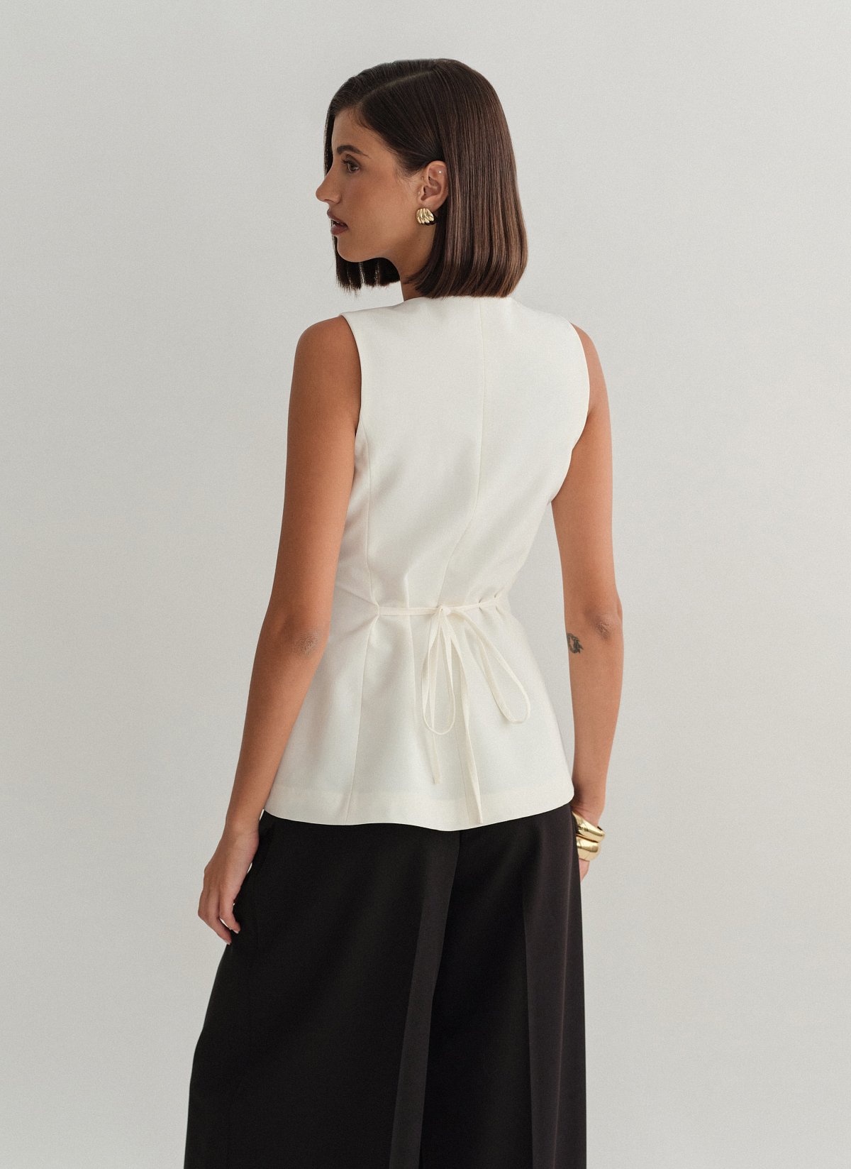 Γυναικείο μεσάτο υφασμάτινο γιλέκο με κουμπιά