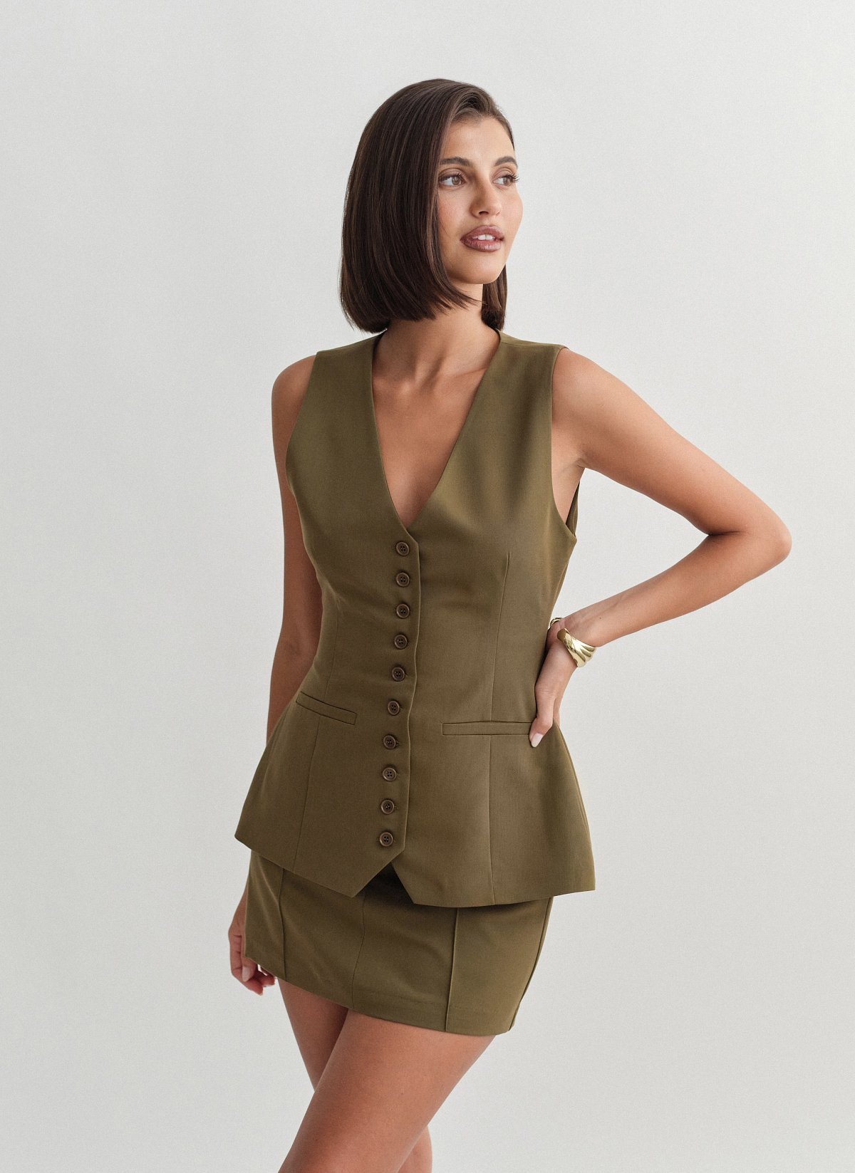 Γυναικείο μεσάτο υφασμάτινο γιλέκο με κουμπιά