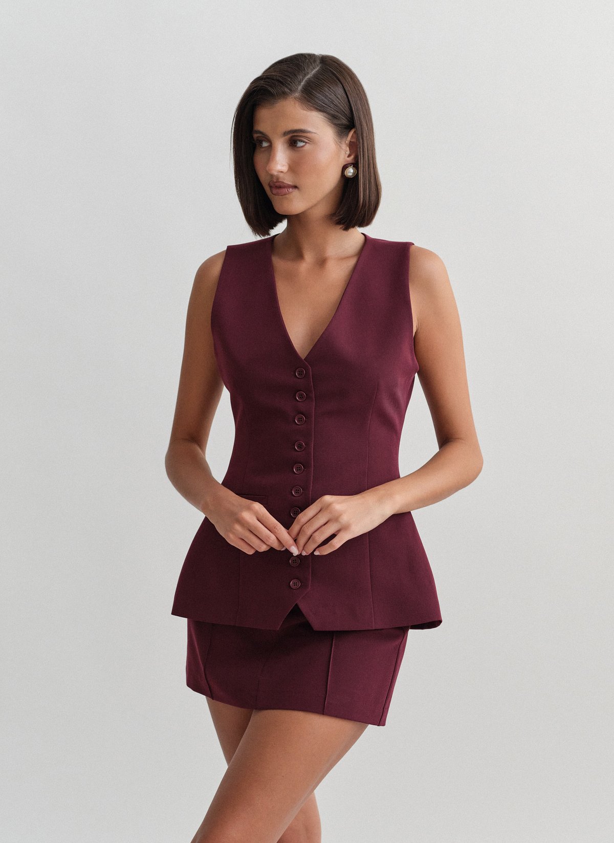 Γυναικείο μεσάτο υφασμάτινο γιλέκο με κουμπιά