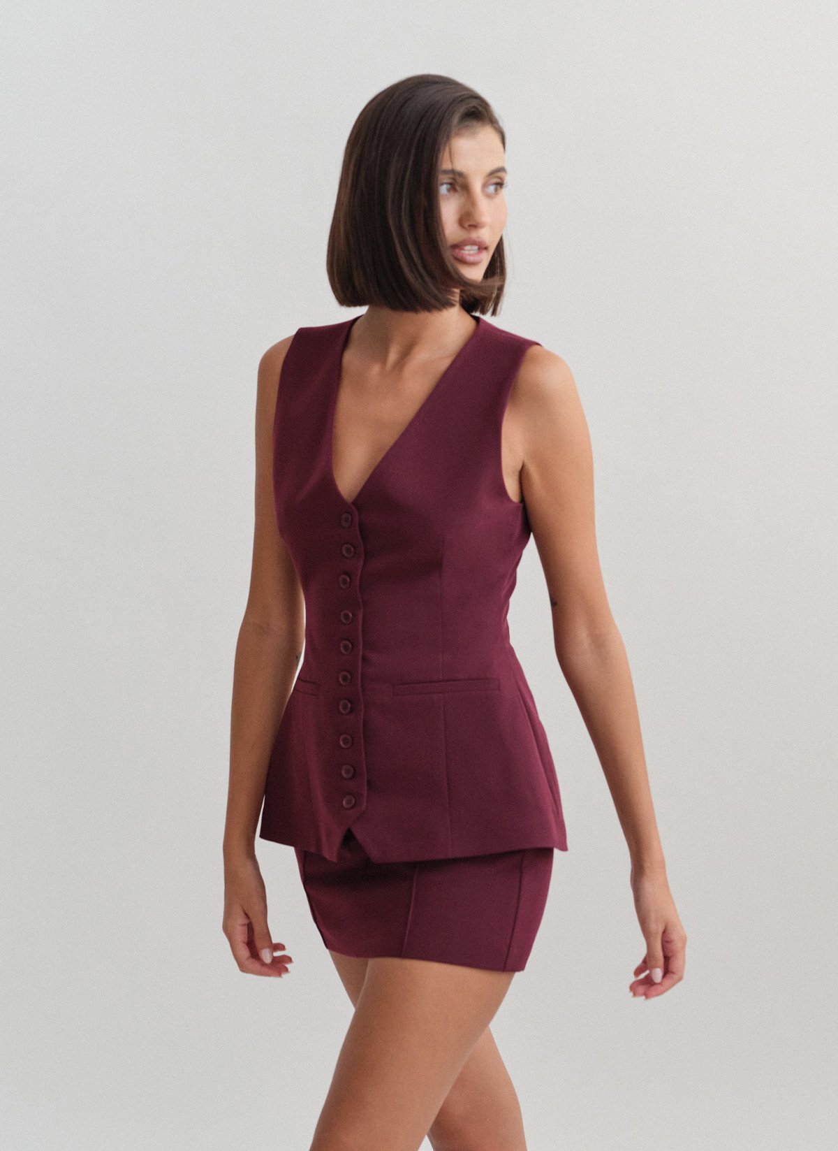 Γυναικείο μεσάτο υφασμάτινο γιλέκο με κουμπιά