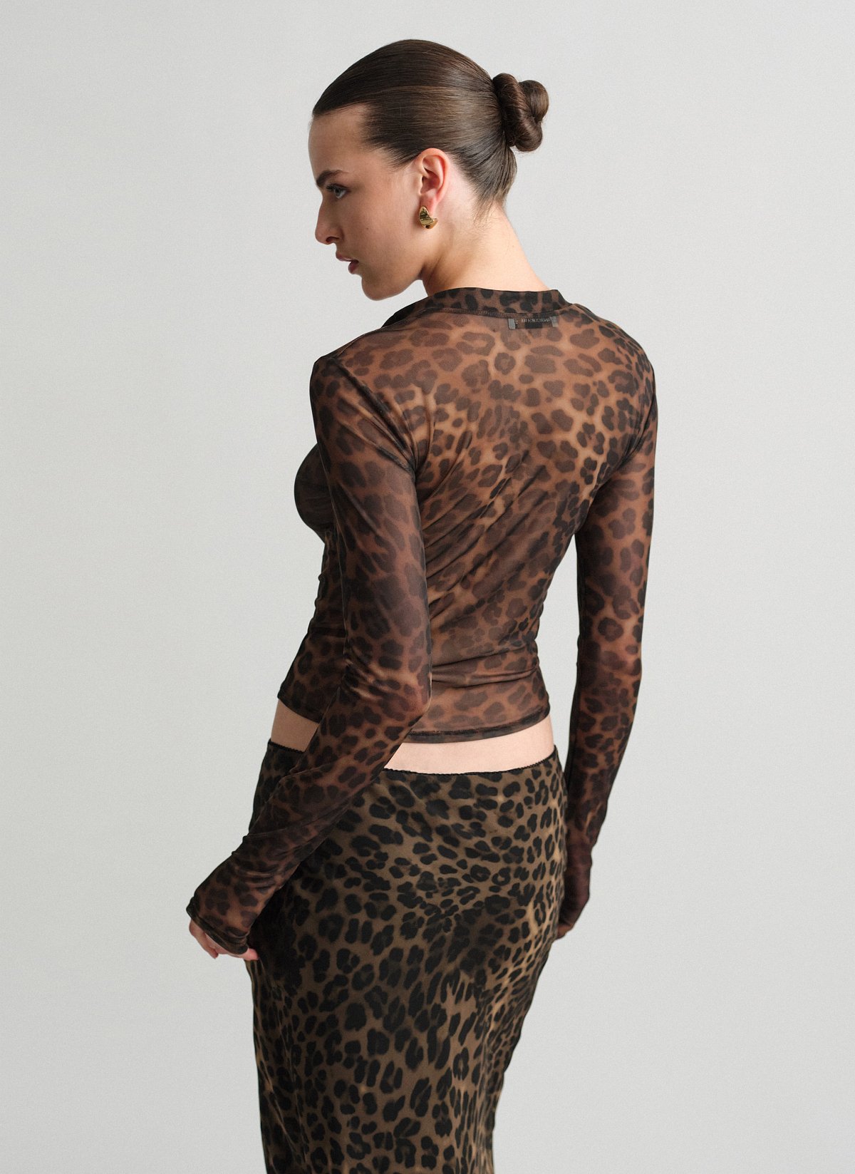 Γυναικεία μακρυμάνικη ημιδιάφανη ζακέτα animal print