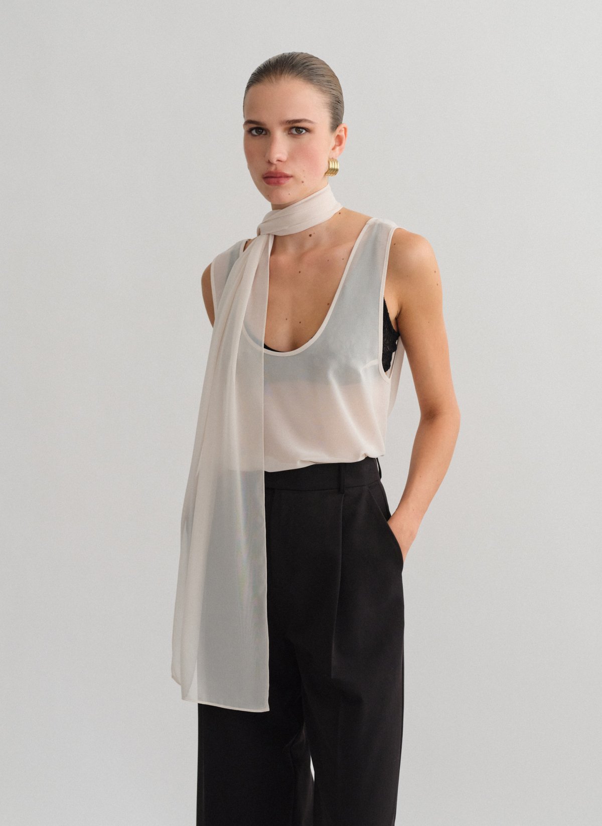 Semi-sheer sleeveless blouse-6