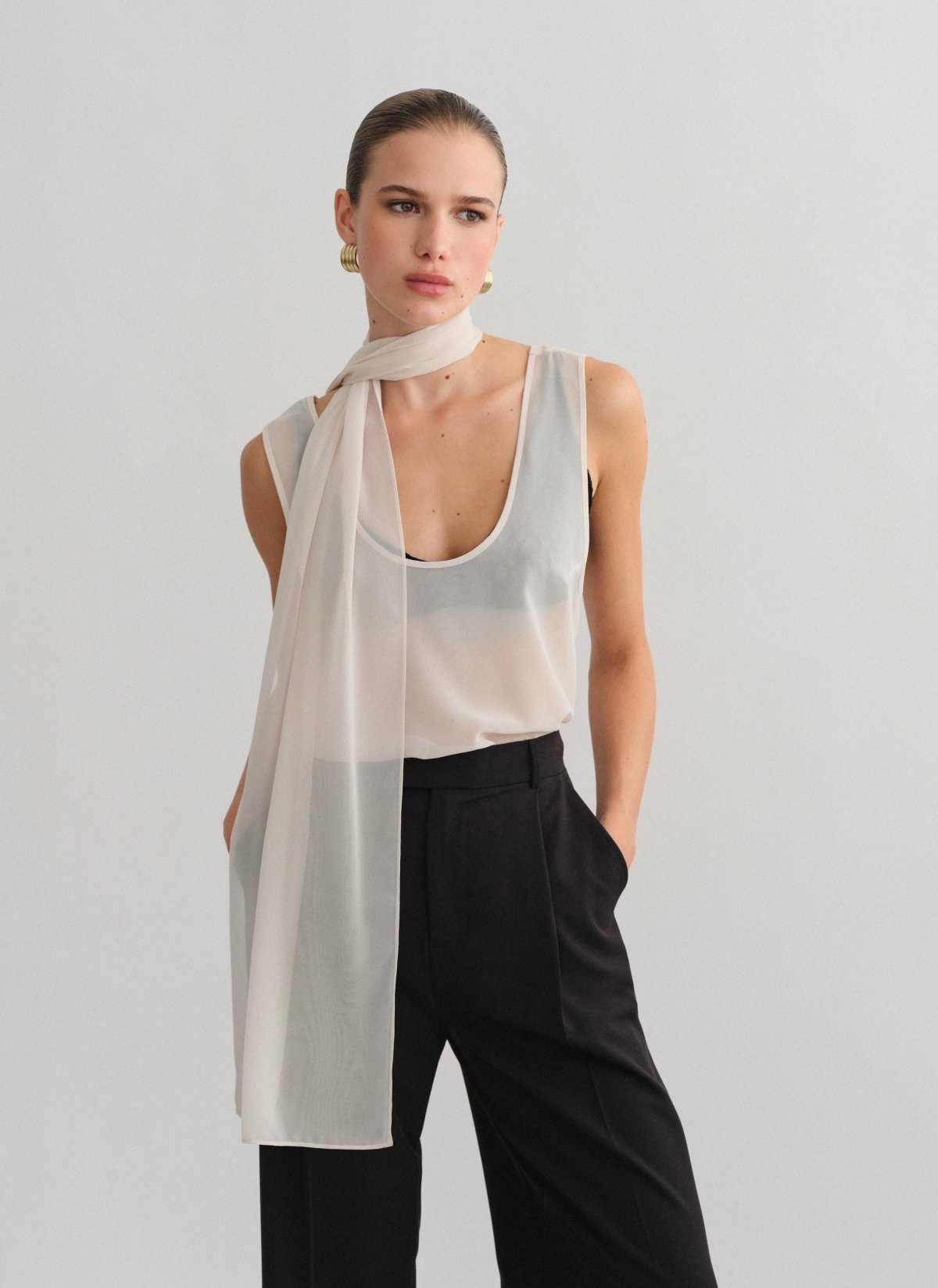 Semi-sheer sleeveless blouse-8