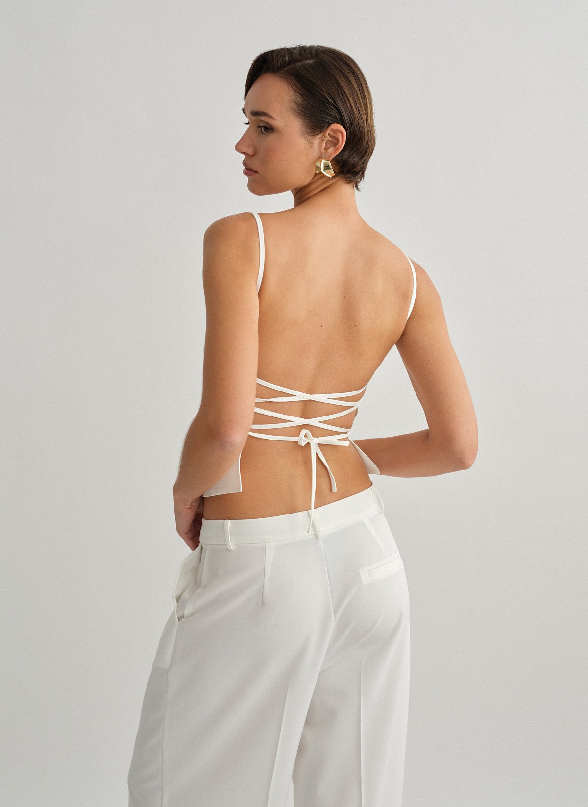 Γυναικείο υφασμάτινο τοπ με χιαστί πλάτη