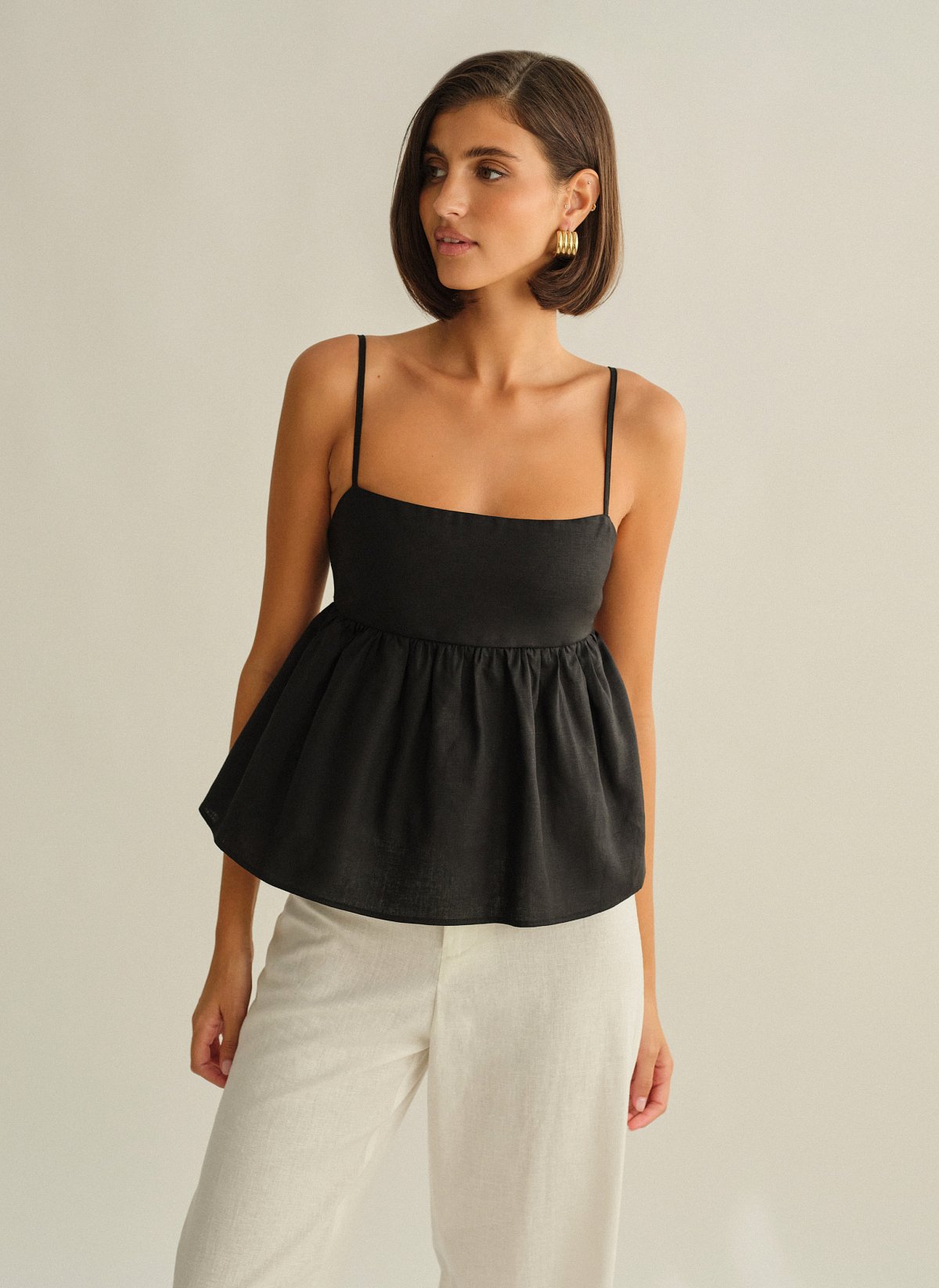 Γυναικεία λινή μπλούζα peplum