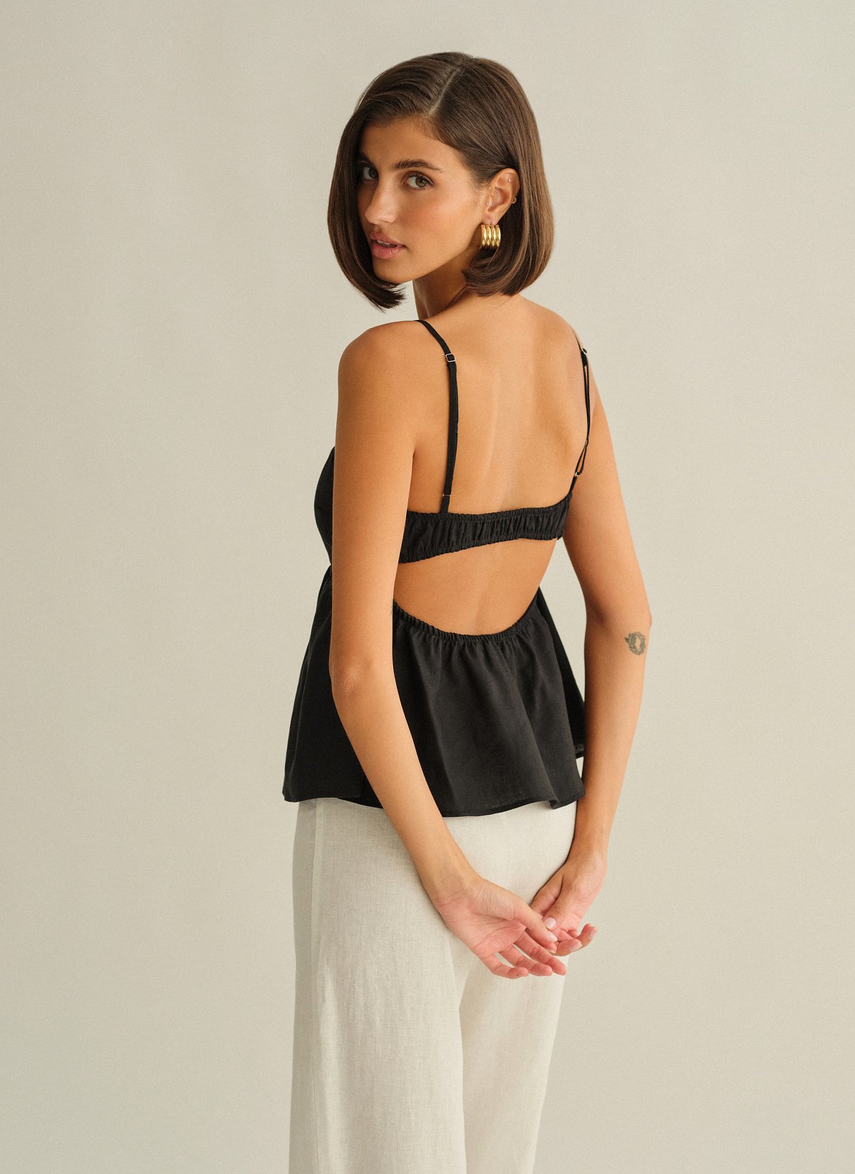 Γυναικεία λινή μπλούζα peplum