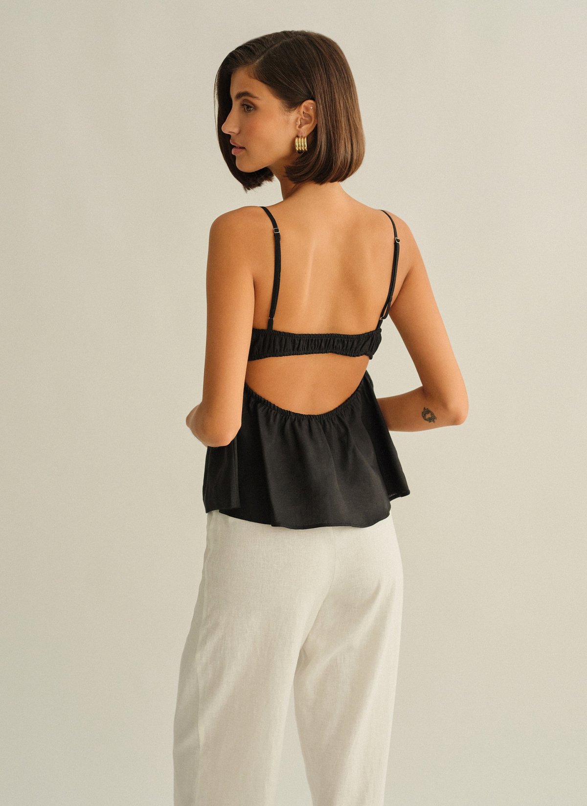 Γυναικεία λινή μπλούζα peplum