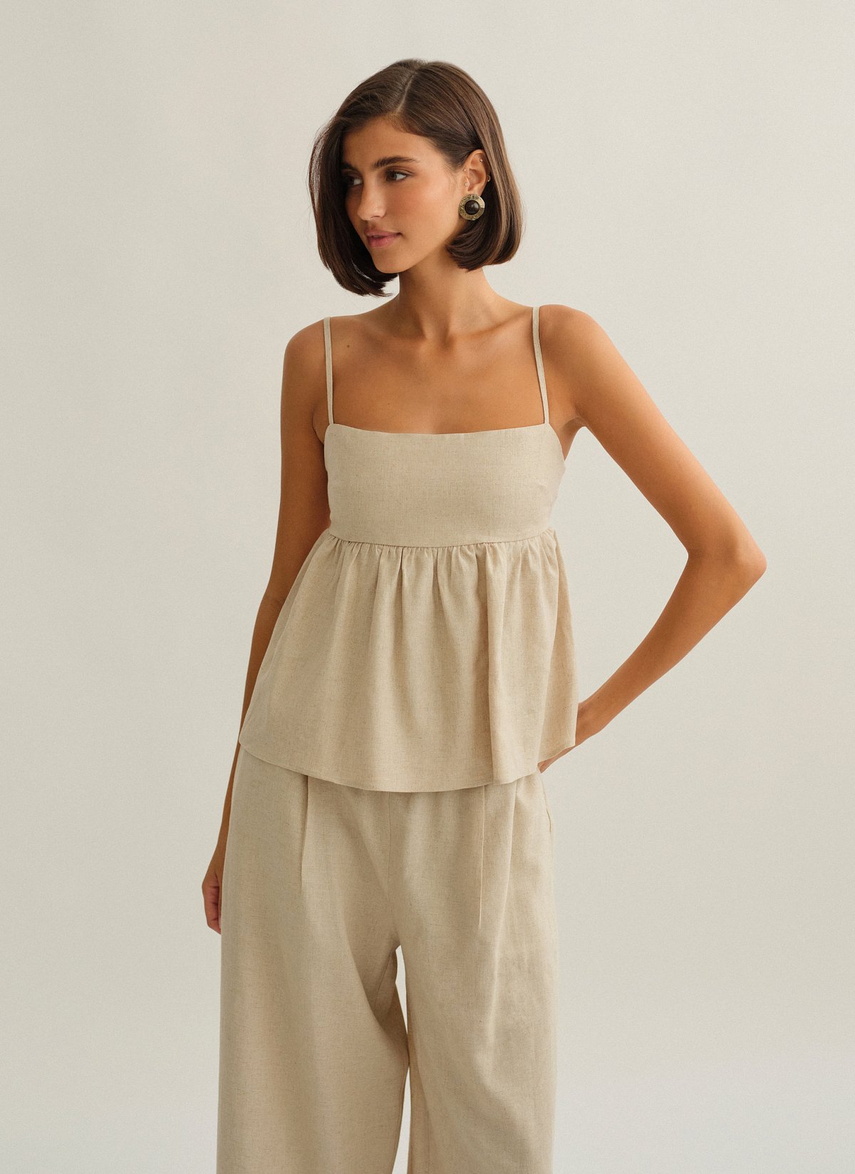 Γυναικεία λινή μπλούζα peplum