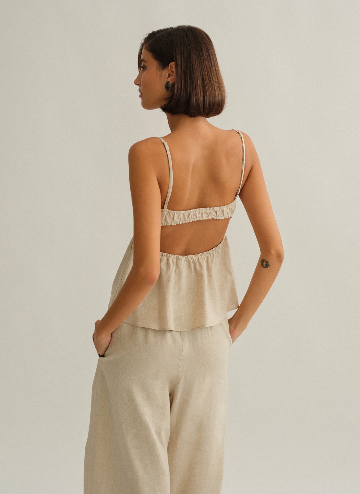 Γυναικεία λινή μπλούζα peplum