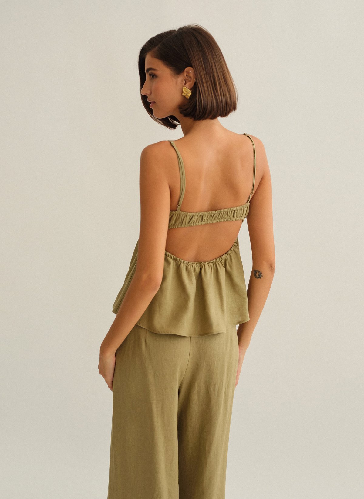 Γυναικεία λινή μπλούζα peplum