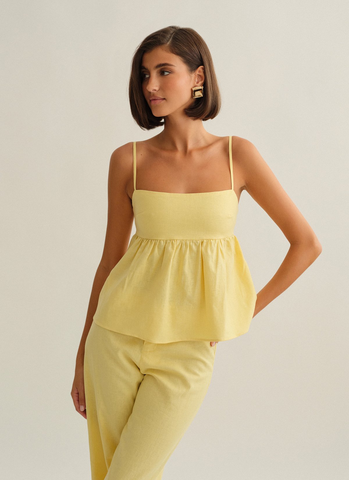 Γυναικεία λινή μπλούζα peplum