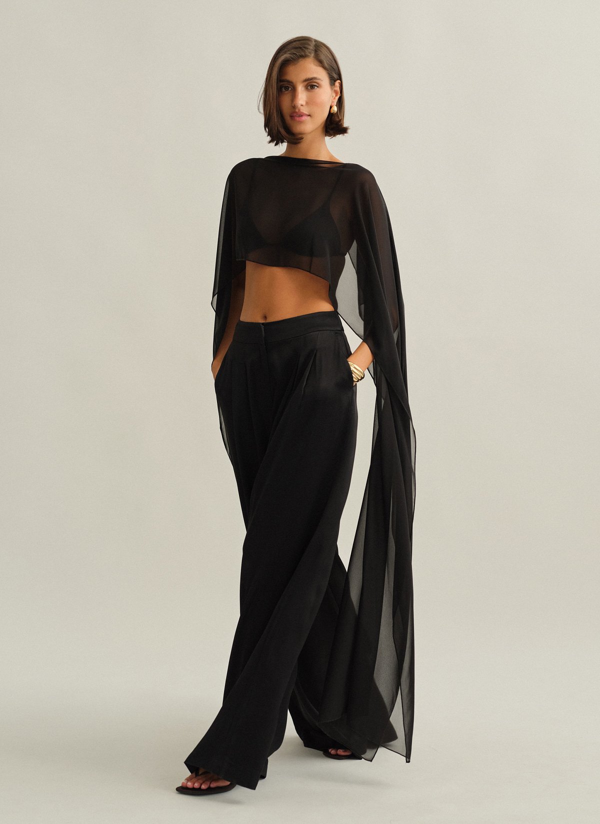 Γυναικεία ασύμμετρη ημιδιάφανη κάπα