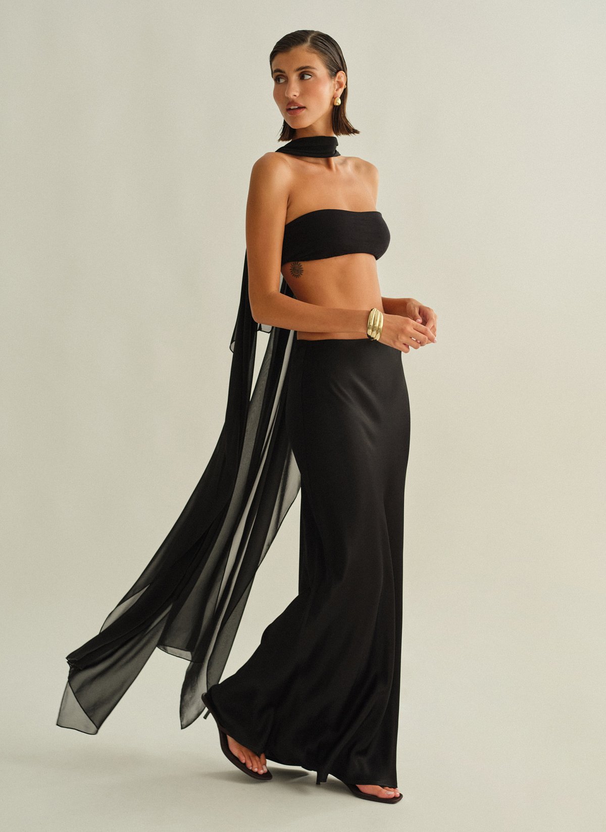 Γυναικεία ασύμμετρη ημιδιάφανη κάπα