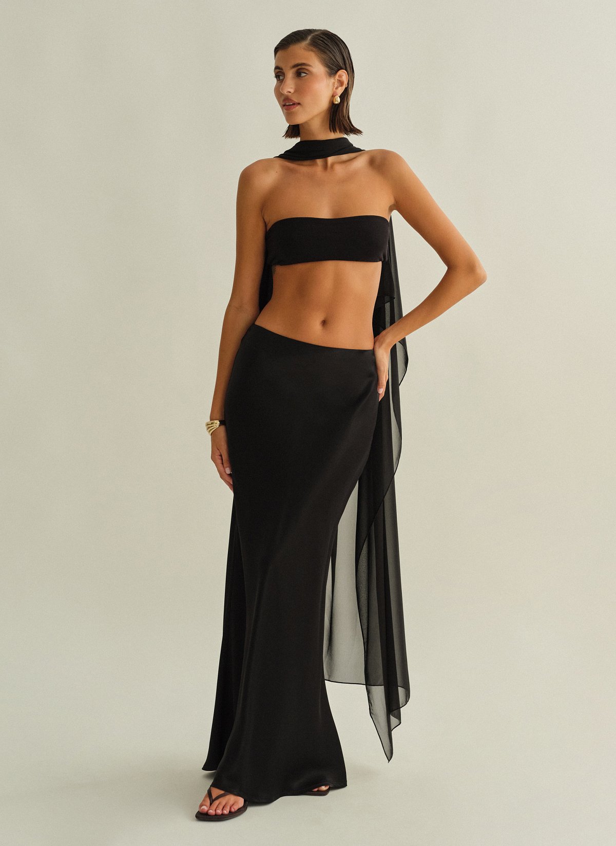 Γυναικεία ασύμμετρη ημιδιάφανη κάπα