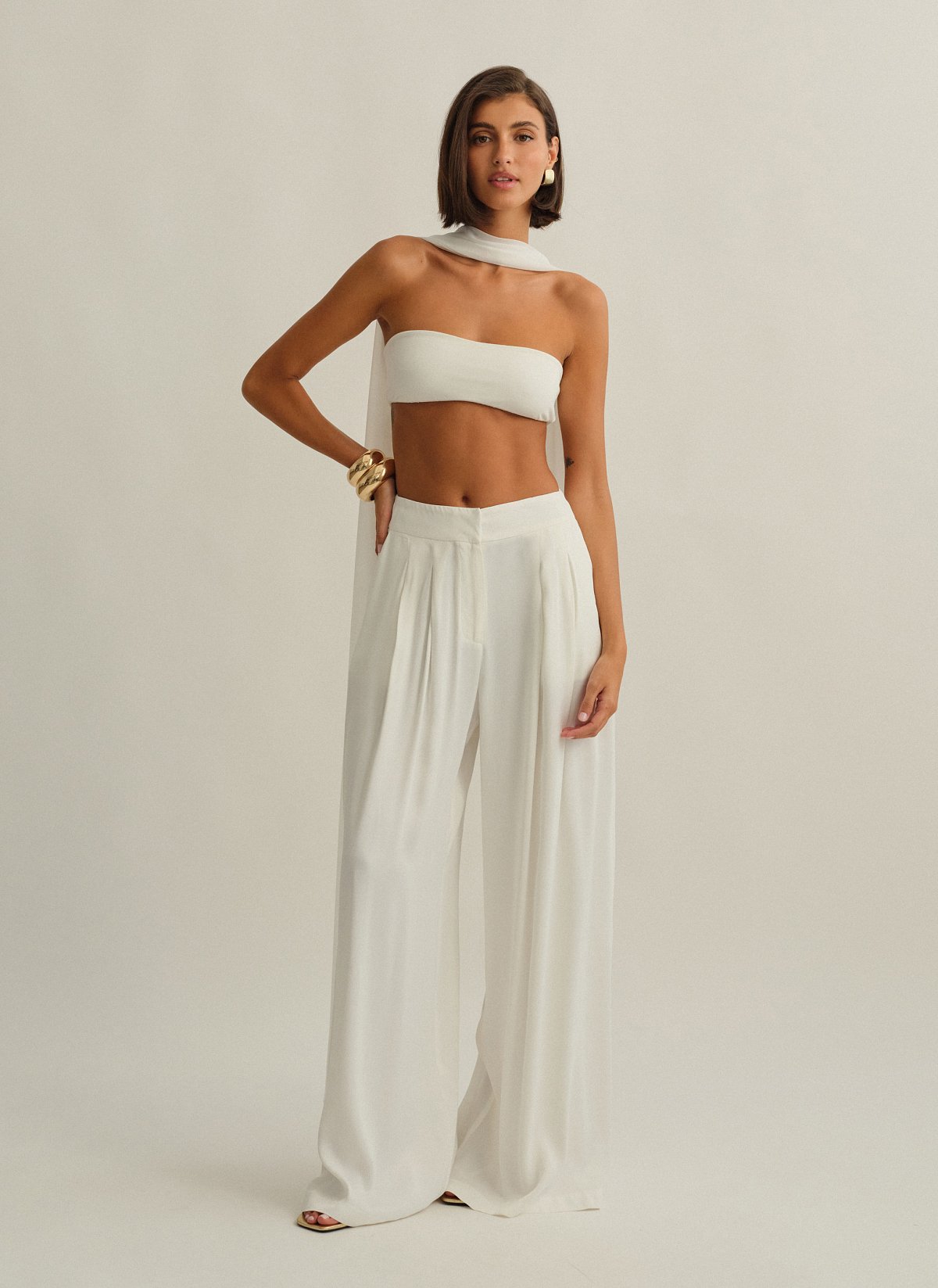 Γυναικεία ασύμμετρη ημιδιάφανη κάπα