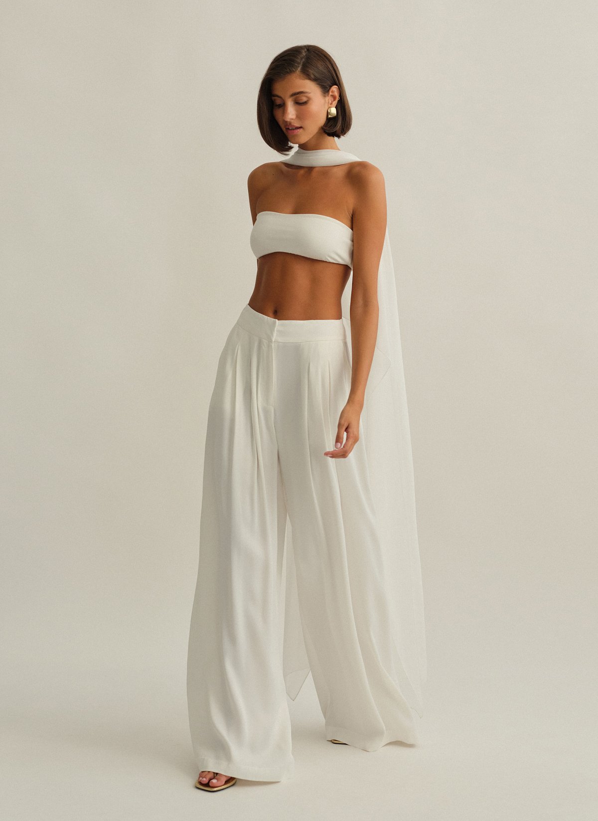 Γυναικεία ασύμμετρη ημιδιάφανη κάπα