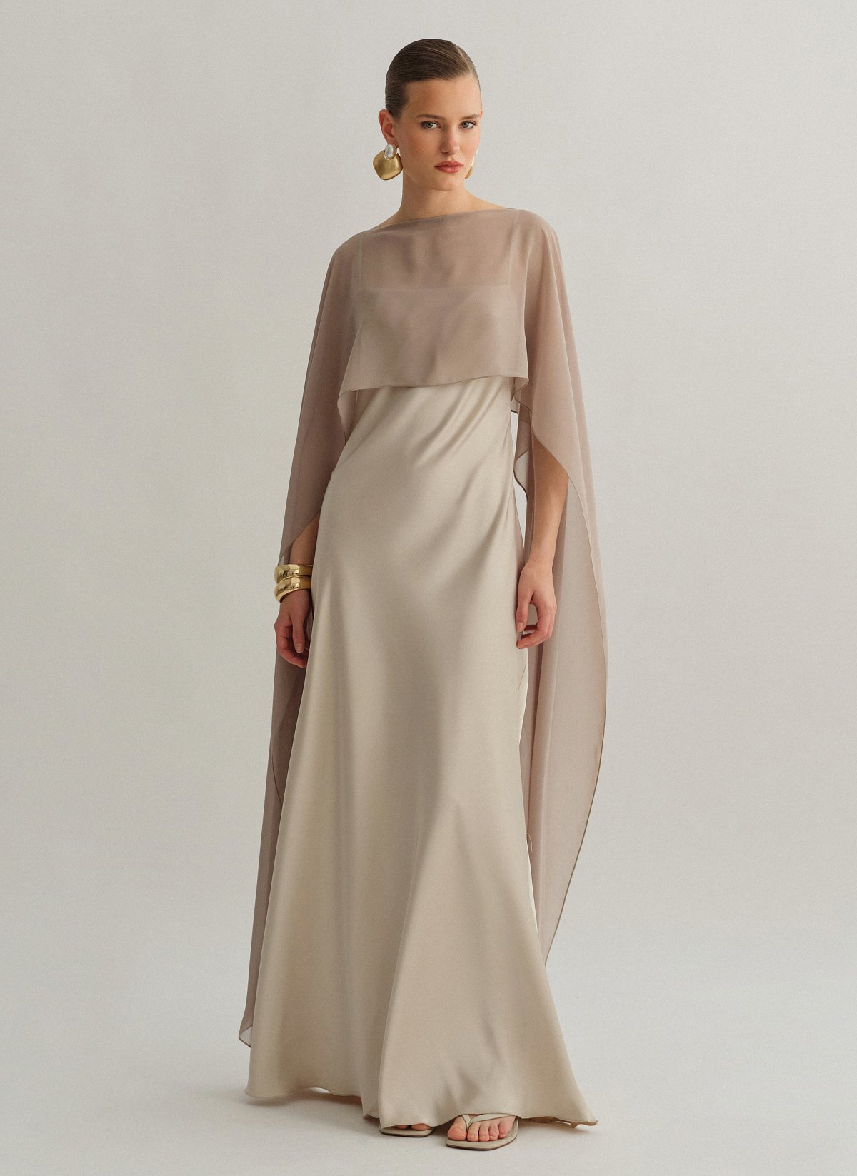 Γυναικεία ασύμμετρη ημιδιάφανη κάπα