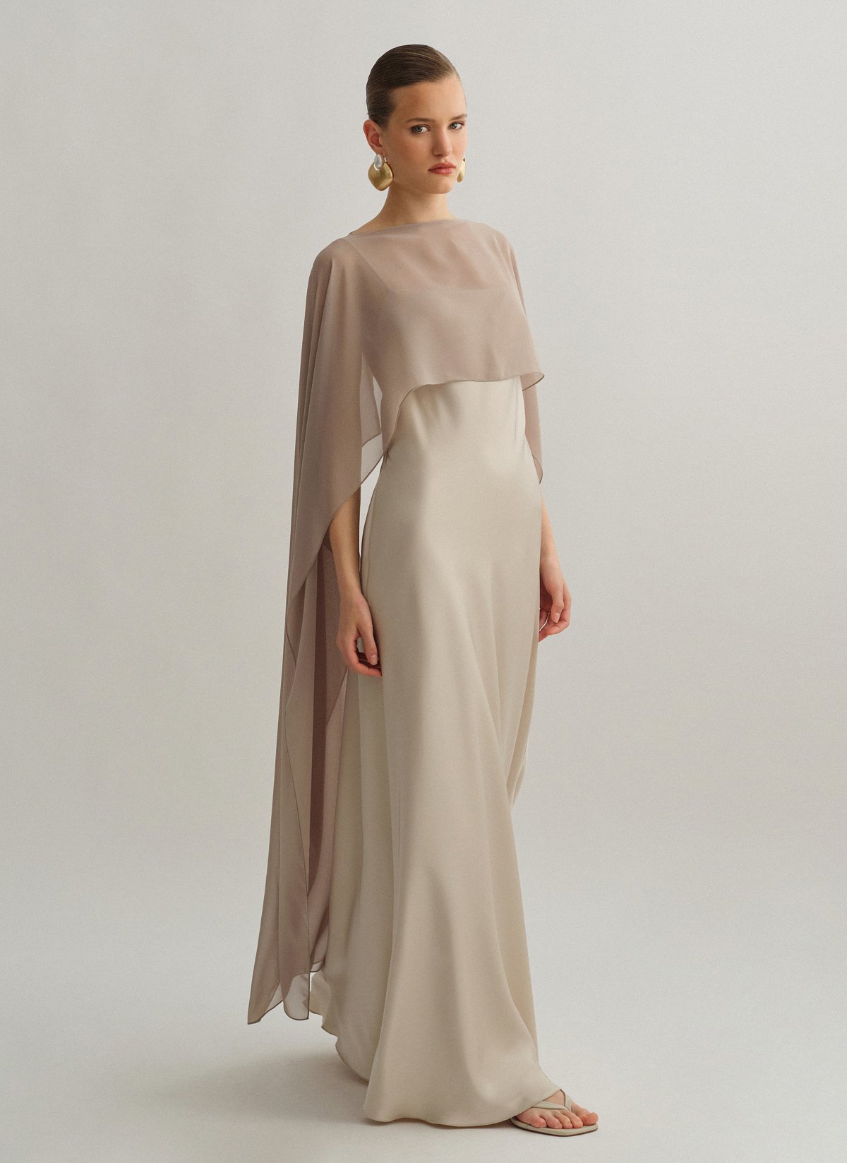 Γυναικεία ασύμμετρη ημιδιάφανη κάπα