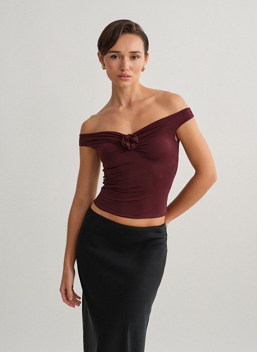 Product: Off-shoulder top with flower detail