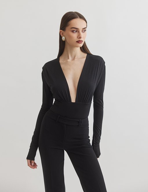 Γυναικείο μακρυμάνικο κορμάκι με ντεκολτέ V