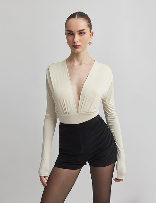 Γυναικείο μακρυμάνικο κορμάκι με ντεκολτέ V