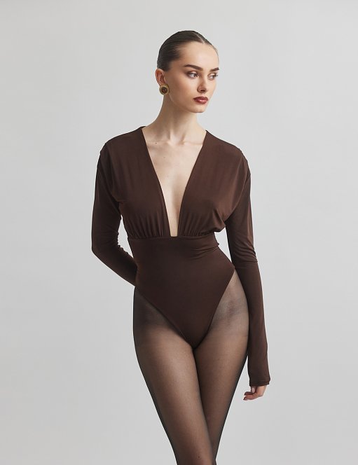 Γυναικείο μακρυμάνικο κορμάκι με ντεκολτέ V