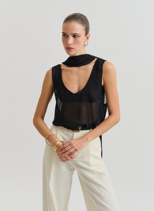 Product: Semi-sheer sleeveless blouse