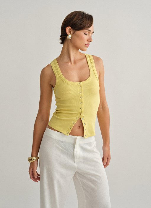 Product: Sleeveless ribbed top with front fastening