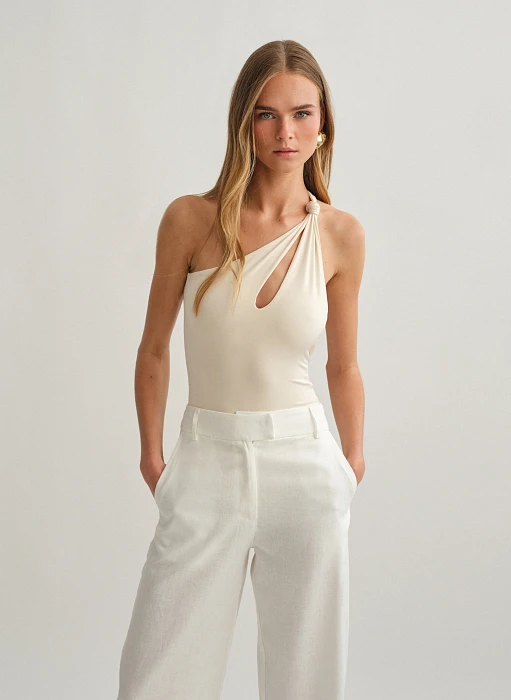 Γυναικείο ασύμμετρο αμάνικο cut out κορμάκι