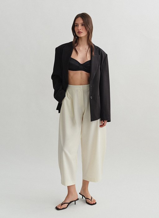 Product: Textured barrel-fit trousers